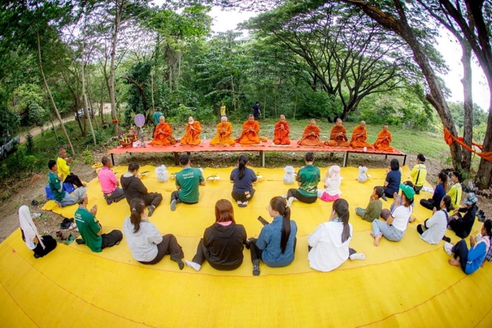Chememan Holds Sapling Ordination Ceremony to Restore Tham Nam Phu Community Forest on Visakha Bucha Day